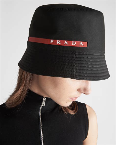 prada bucket hat linea rossa|Black Technical Fabric Bucket Hat .